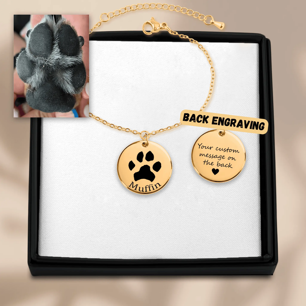"Custom gold bracelet with actual dog paw print and name engraving"
